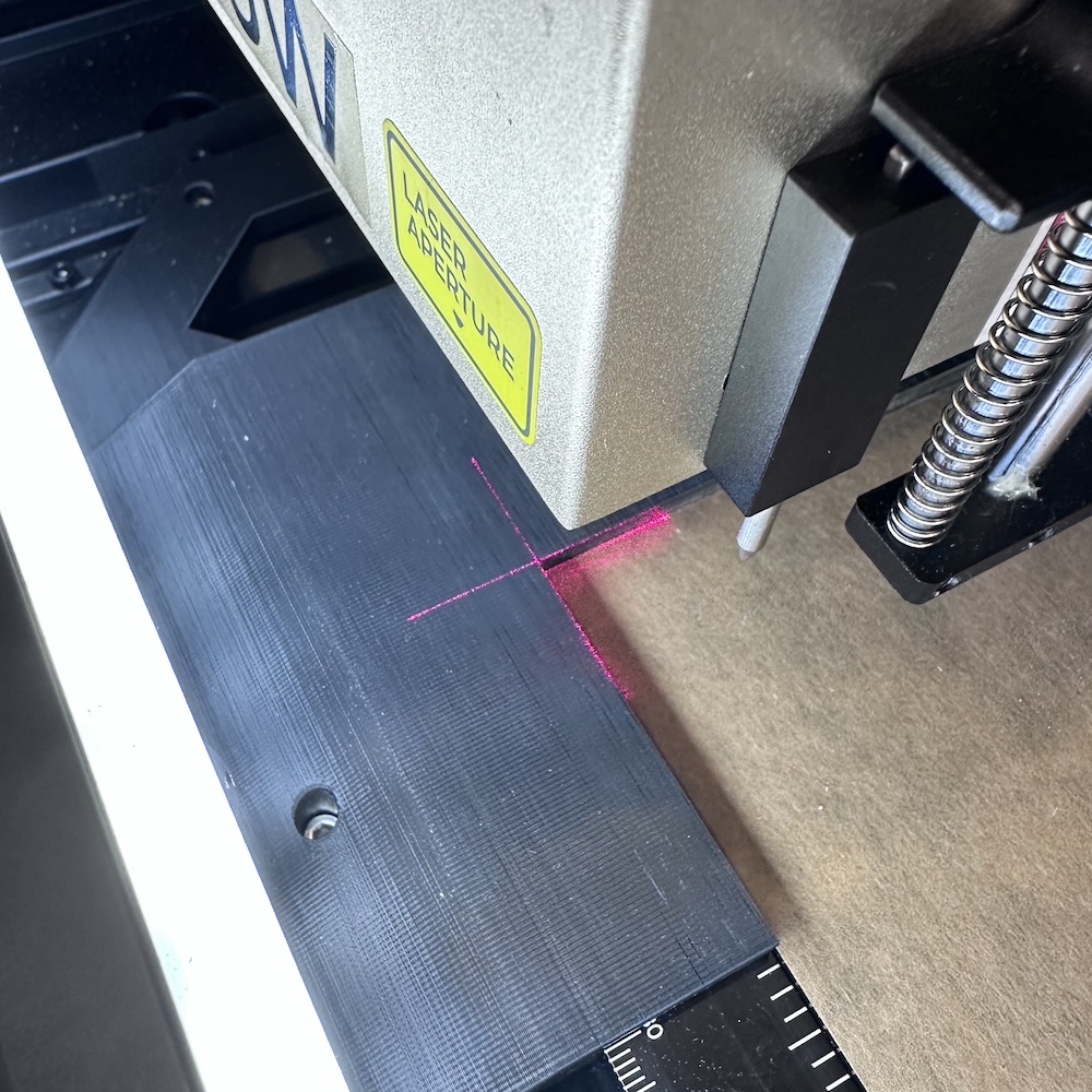 Use the laser crosshairs to perfectly zero the laser's position relative to the (now parallel) material.